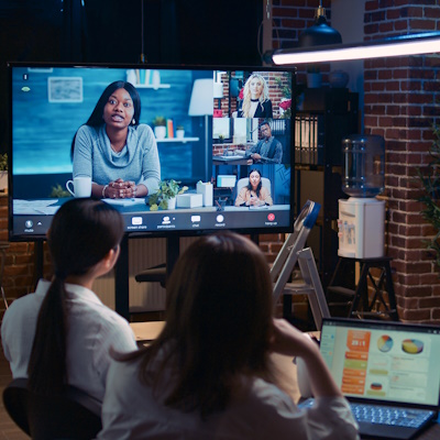An image showing a team in a meeting, using Microsoft Teams.