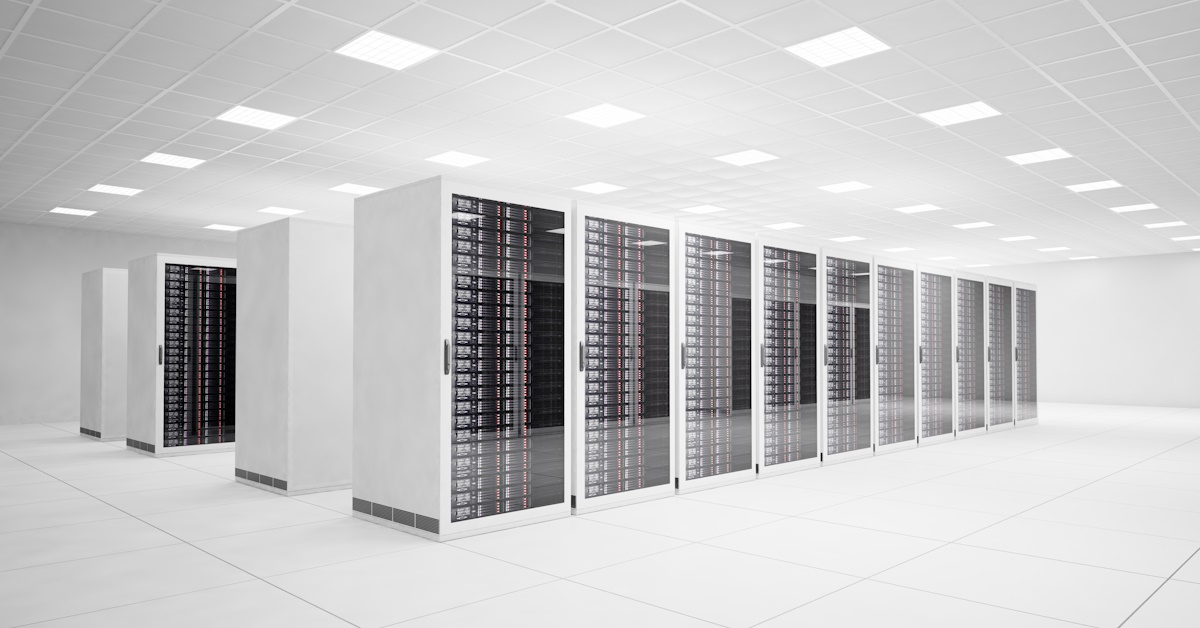 An image of server racks filled with servers inside of a data center.