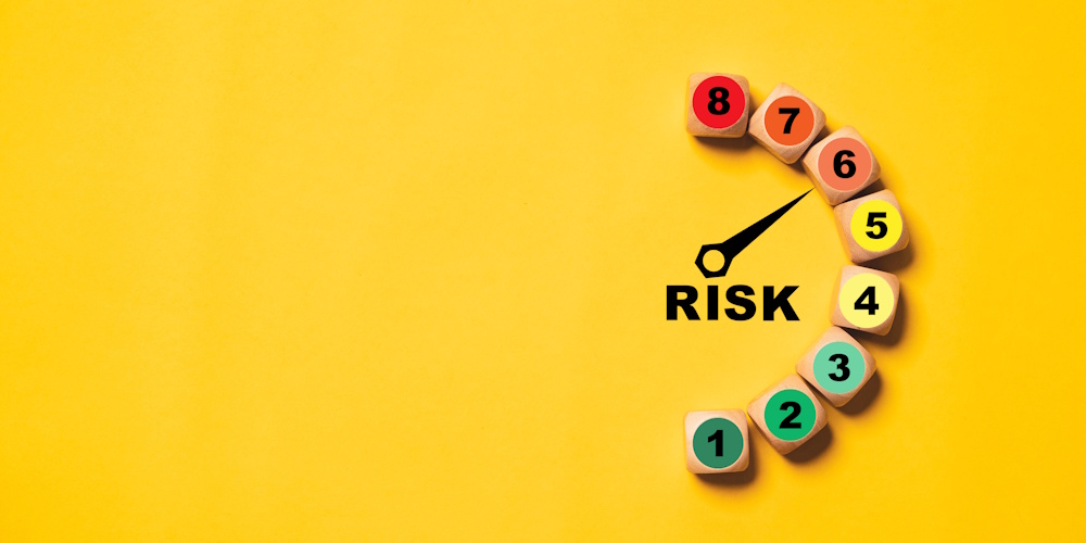 An image showing a needle gauging the level of risk from 1 - 8.