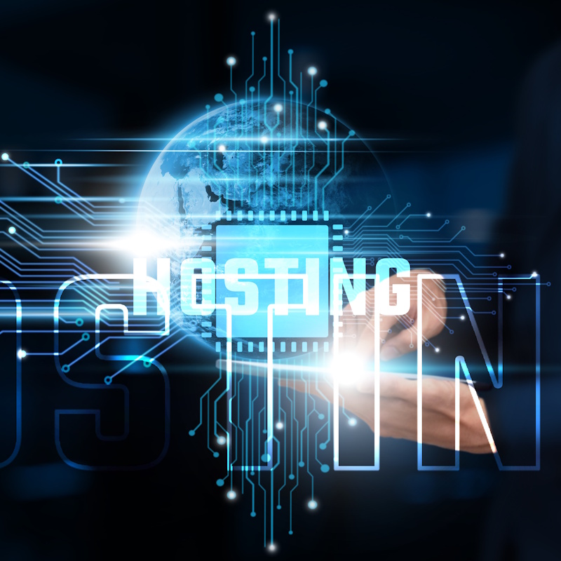 An image of the earth in the background, a person on a tablet, and the word hosting in the foreground.
