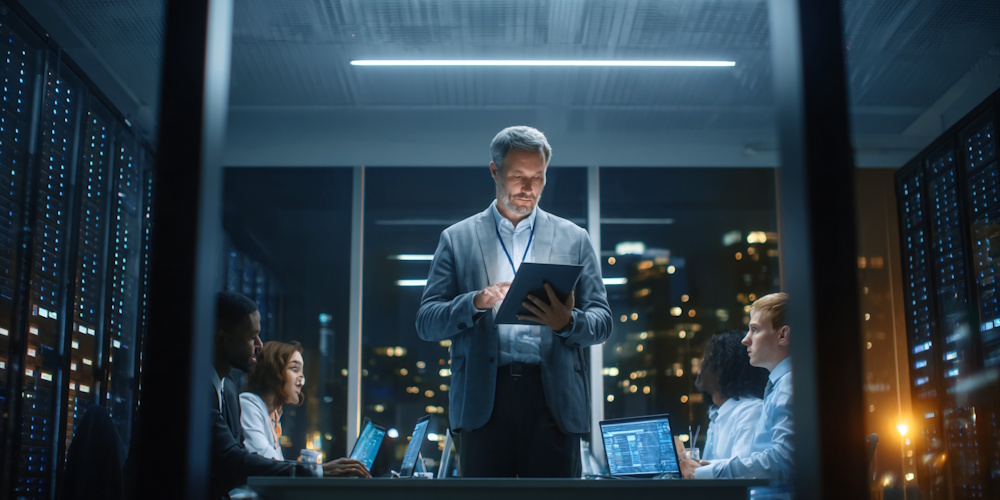 DiDPic4_1589212551 An image of a managed security team meeting in a conference room.